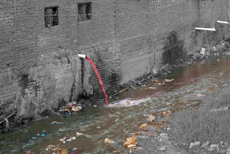 Wastewater from a textile dyeing industry being discharged untreated into a stormwater drain for disposal into river Yamuna in South-East district, National Capital Territory of Delhi